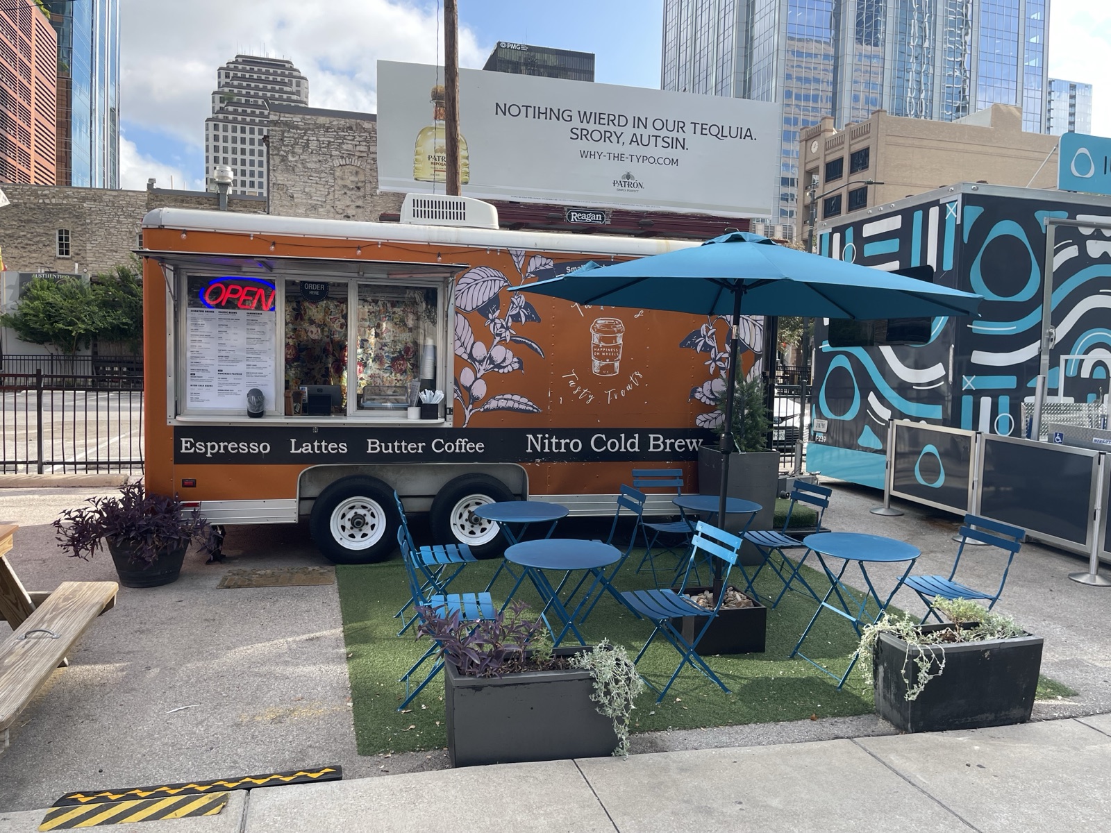 Outdoor seating beside the Mudhouse Cafe trailer